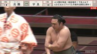 右腕を押さえる炎鵬