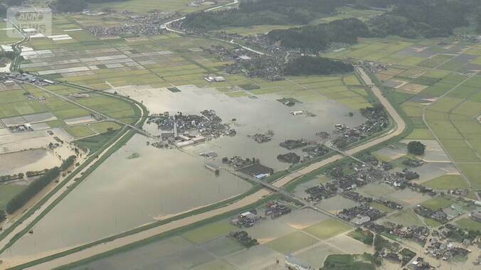 富山・石川で記録的大雨　街の水引かず各地で被害の爪痕残る　29日も大雨となる可能性 1枚目