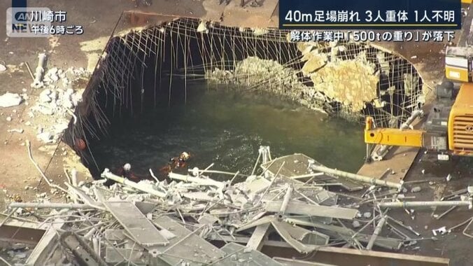 穴に潜るダイバー