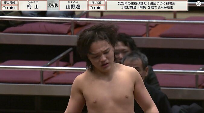 熱戦を物語る乱れ髪