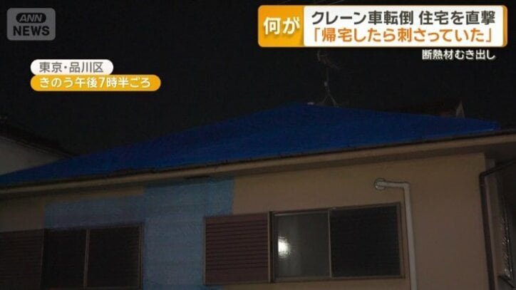 ブルーシートが貼られている住宅