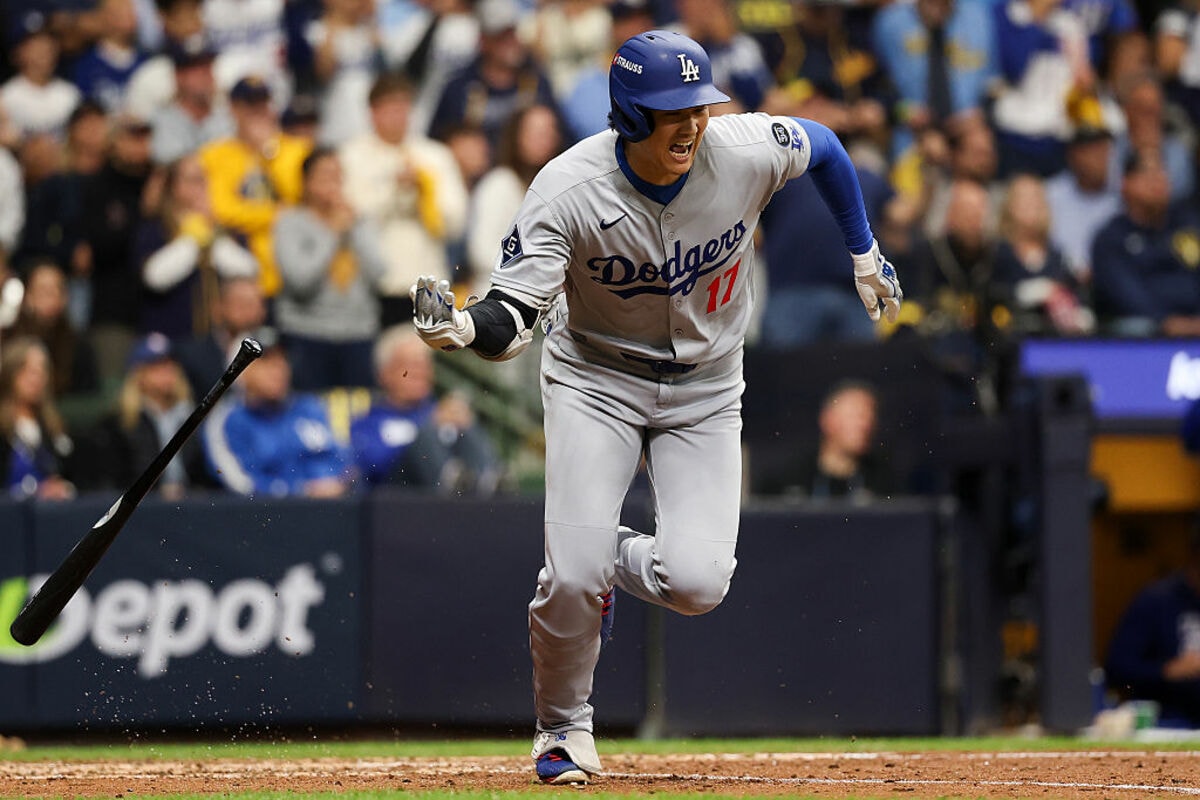 Shohei Ohtani running after making contact for the Dodgers