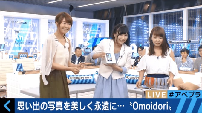 東日本大震災が開発のきっかけ　思い出の写真を簡単にデータ化できるガジェット 1枚目