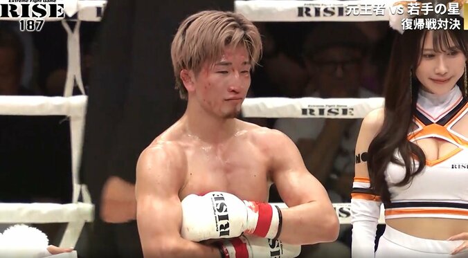 仁王立ちの梅井