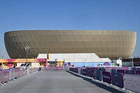 アルゼンチンの優勝は神のみぞ知る　W杯会場でカメラマンが“笑顔と十字”で回答