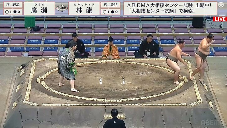 相撲に負けて体操で勝った？土俵下に落ちる力士、満点レベルの両足着地ピッタリ