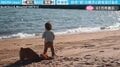 砂浜デビューの1歳息子とコーギーの“微笑ましい動画”に「なんて幸せあふれる風景なの…」「海での遊び方指導中かな？」と反響