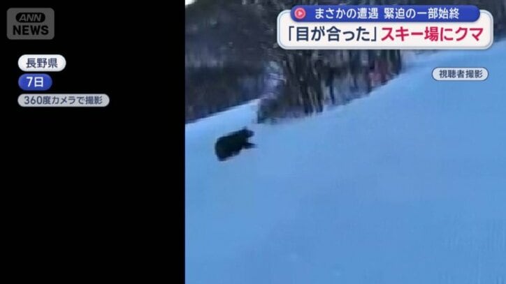 男性の左手前に現れた黒い影