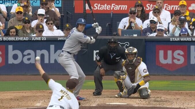 スライダーを投じる松井