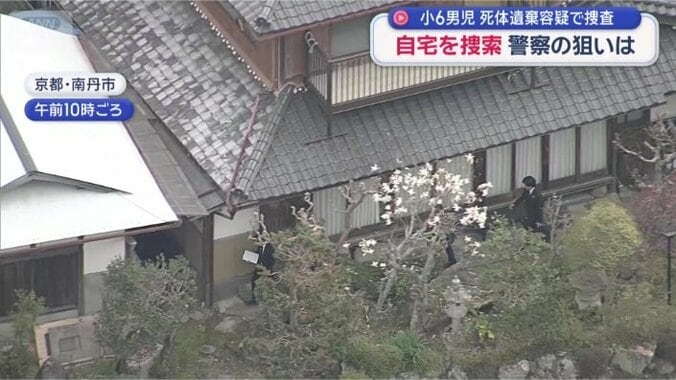 捜査員が行き交う