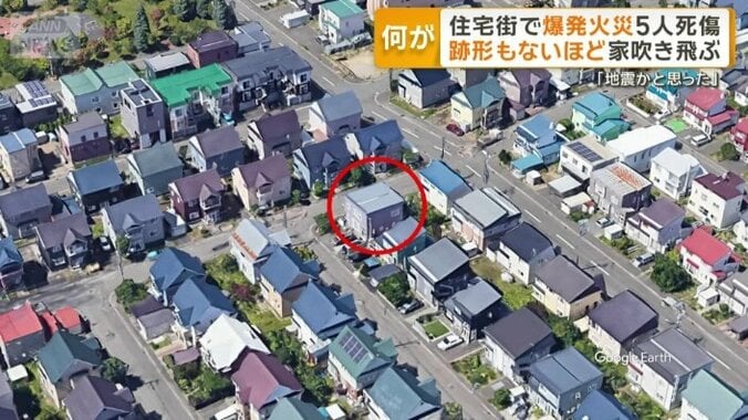 住宅街にあったグレーの屋根の家