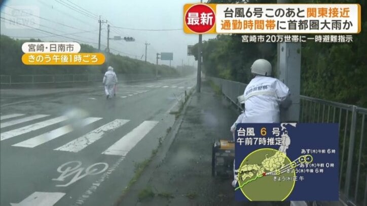 警察官が発電機を使って信号を復旧