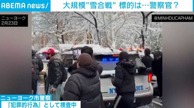 雪を投げる人ら