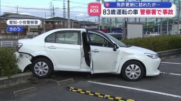 駐車場の植え込みに後ろから突っ込んだ車