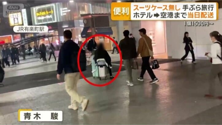 人通りの多い道を…