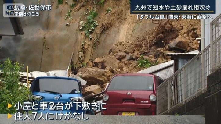 小屋と車2台が下敷きに