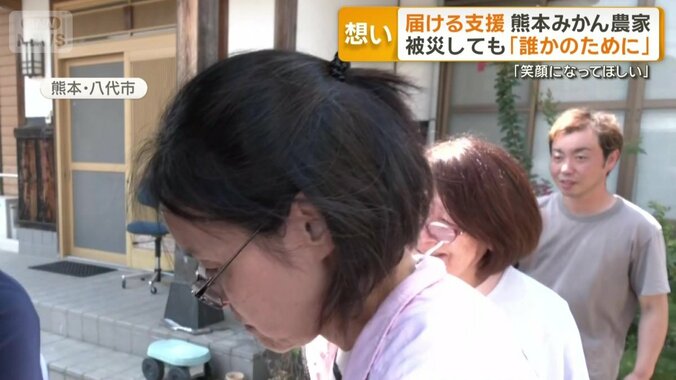 遠くから控えめに見守る高岡さん