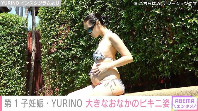 YURINO、大きなおなかやタトゥーが印象的なビキニショット