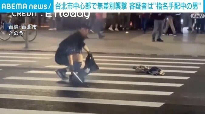 刃物を持つ容疑者