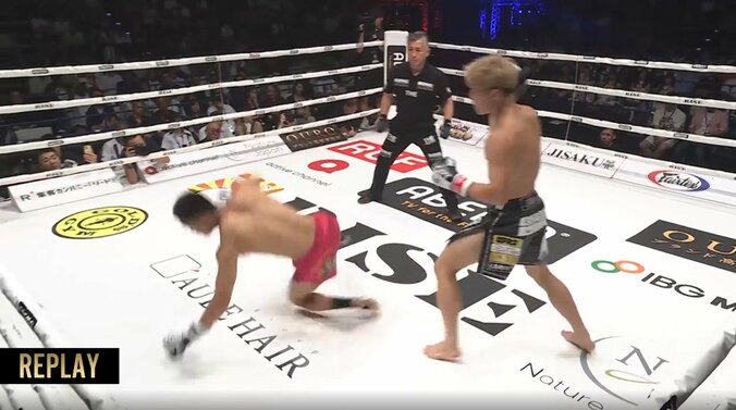 捻じれて一回転の衝撃ダウン